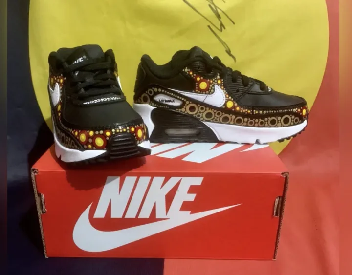 Custom sneakers with Kalari Art hand-painted artwork